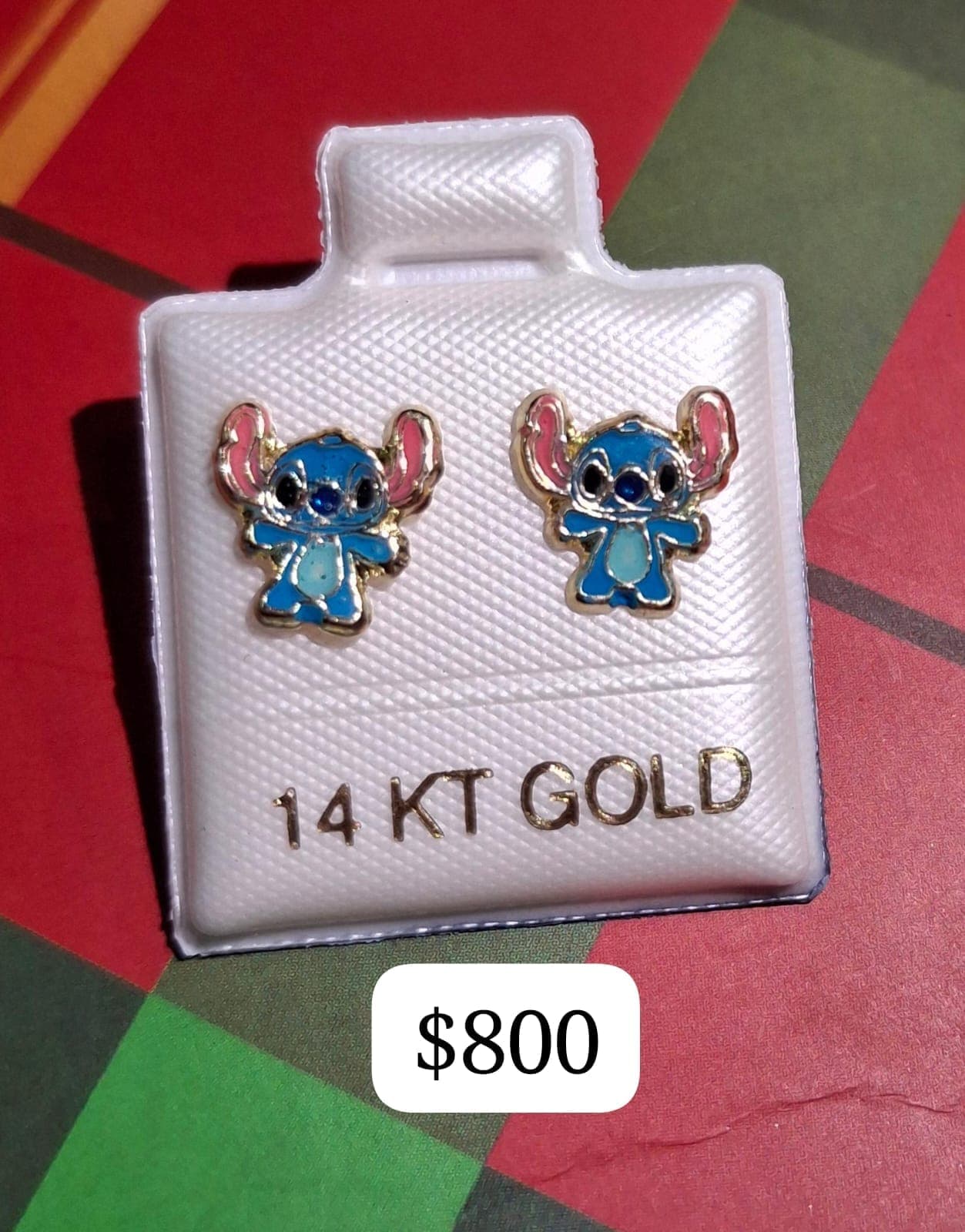 Aretes de Stitch en oro de 14 quilates